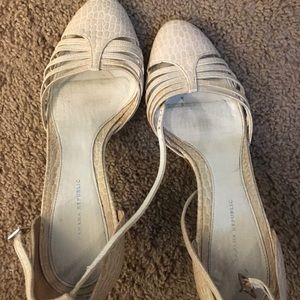 Ivory snake skin heel with strappy ankle